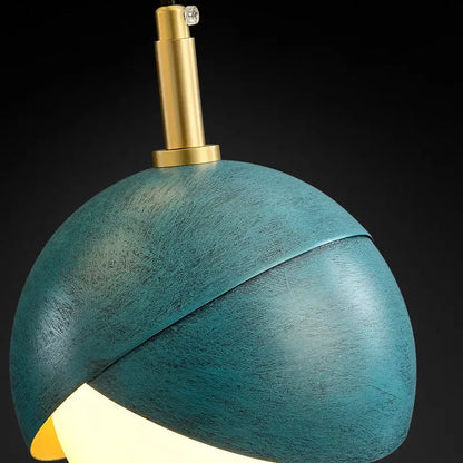 Modern teal glass pendant light with textured matte finish and brass fixture ideal for kitchen island decorbites blue copper