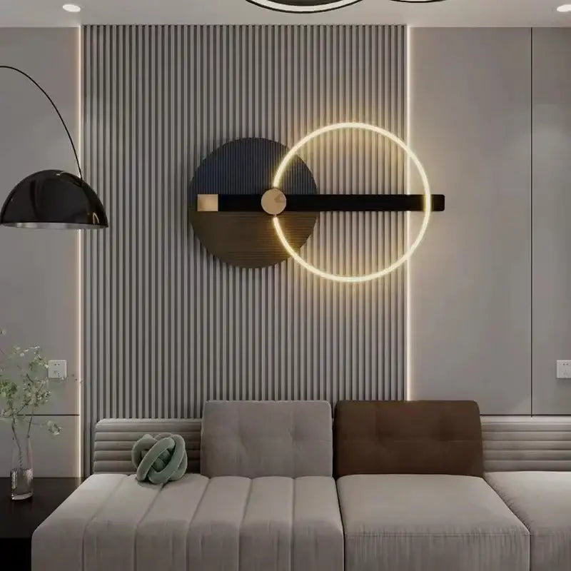 Modern teal and gold led wall sconce with a glowing gold ring and black matte colorful metal accents for bedroom use
