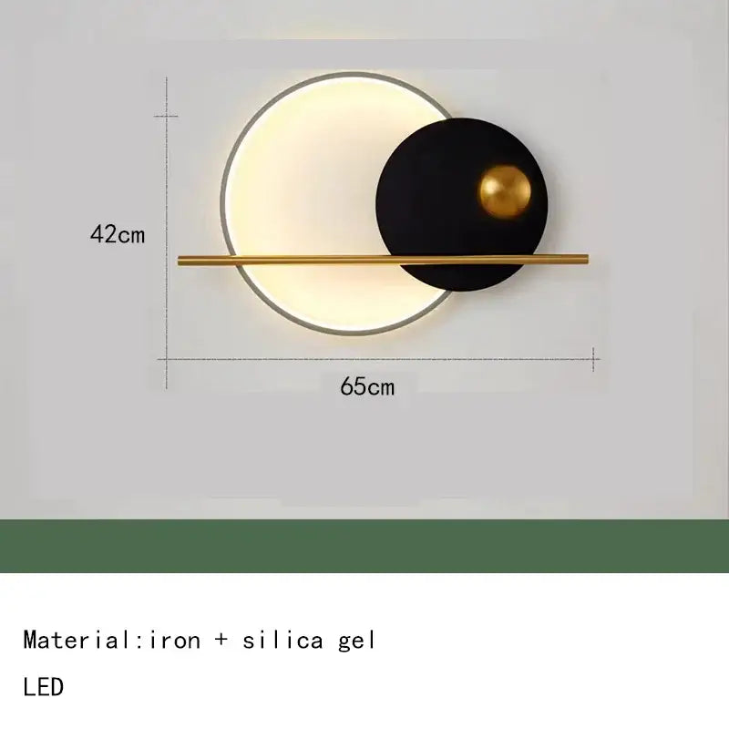 Modern teal and gold led wall sconce with colorful metal accents featuring a glowing circular light and brass bar