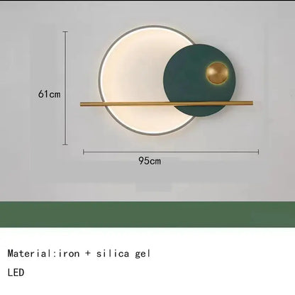 Modern teal and gold led wall sconce with colorful metal circular design featuring illuminated white disc and brass accents