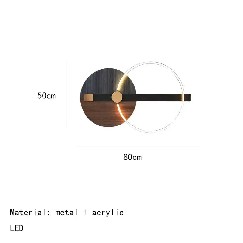 Modern teal and gold led wall sconce with colorful metal circular base, black acrylic arm, and warm translucent ring light