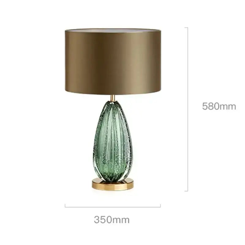 Elegant green and gold glass table lamp with teardrop texture and brushed gold base for modern bedroom decorbites glass table