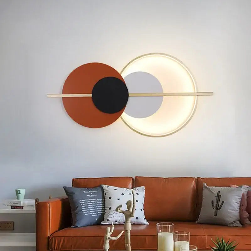 Modern terracotta and black decorbites circular wall lamp with gold frame and warm glow luxury wall lamp for bedroom