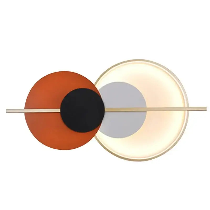 Modern terracotta and black decorbites circular wall lamp with sleek gold bar and dual circular shades for bedroom lighting
