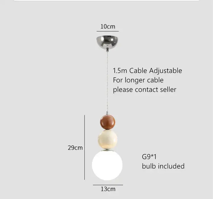 Modern terracotta and sage green pendant lights featuring colorful ball glass orbs in matte white warm brown and chrome