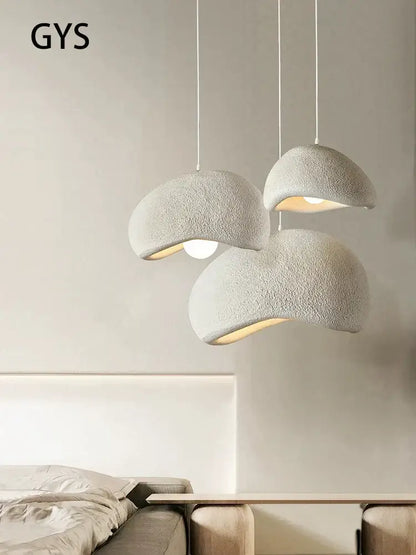 Three off-white textured pendant lights with a cream cloud chandelier design for dining room decorbites cream cloud