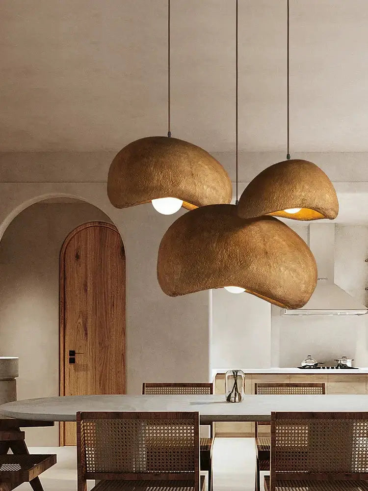 Three warm-toned decorbites cream cloud chandelier pendant lights with textured earthy finish for dining room decor