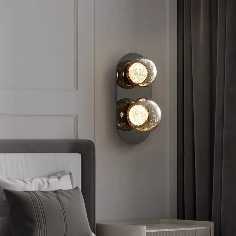 Modern textured glass ball sconce lamp with gold-toned metal and frosted globes for bedroom aisle decorbites sconce lamps