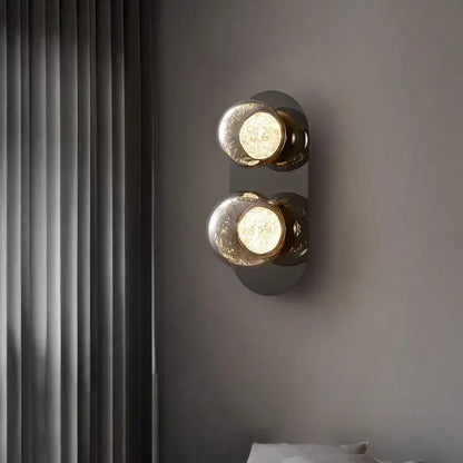 Modern double-bulb glass ball sconce lamp with frosted globes and brushed brass for bedroom aisle decorbites sconce lamps