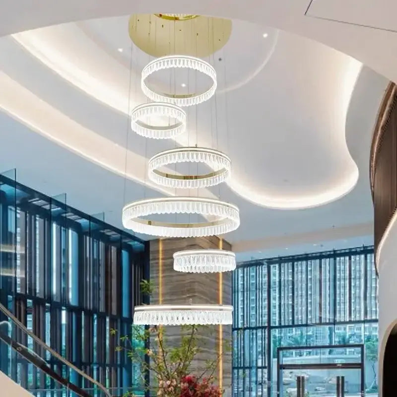 Modern three tier gold crystal led chandelier with cascading rings for dining room decorbites modern crystal lighting