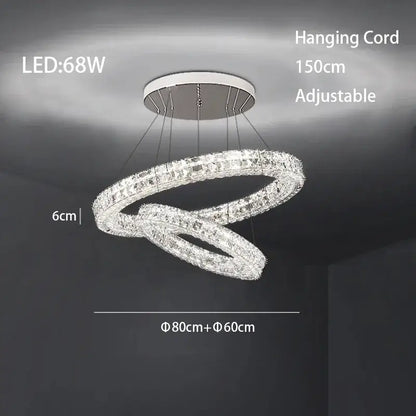 Modern three tiered decorbites crystal led chandelier with clear crystal accents and white ceiling mount for living room