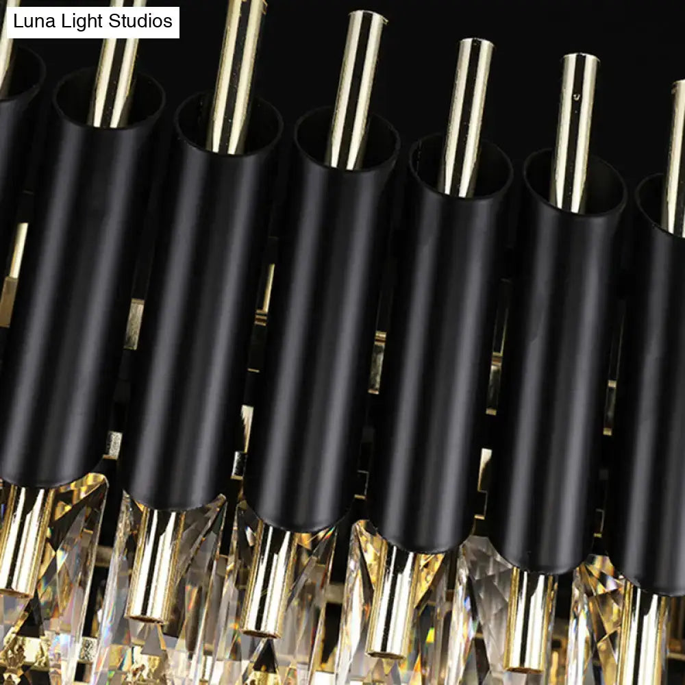 Modern tiered black ceiling light with clear crystal accents and gold metallic rods for kitchen island lighting