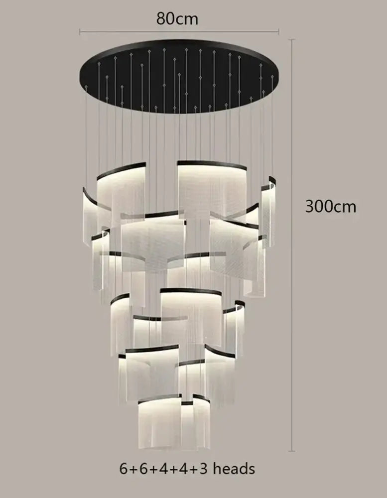 Modern tiered gold led ceiling chandelier with black mount and white translucent tiers for elegant dining room lighting