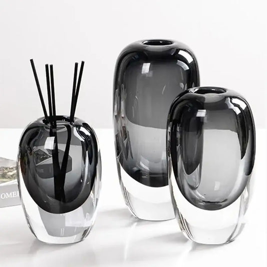 Set of three modern translucent black crystal glass flower vases with a glossy finish for living room decorbites crystal glass decor
