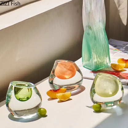 Modern translucent blue colorful glass vase with sculptural clear glass tumblers and colorful ice spheres flower pot decorbites