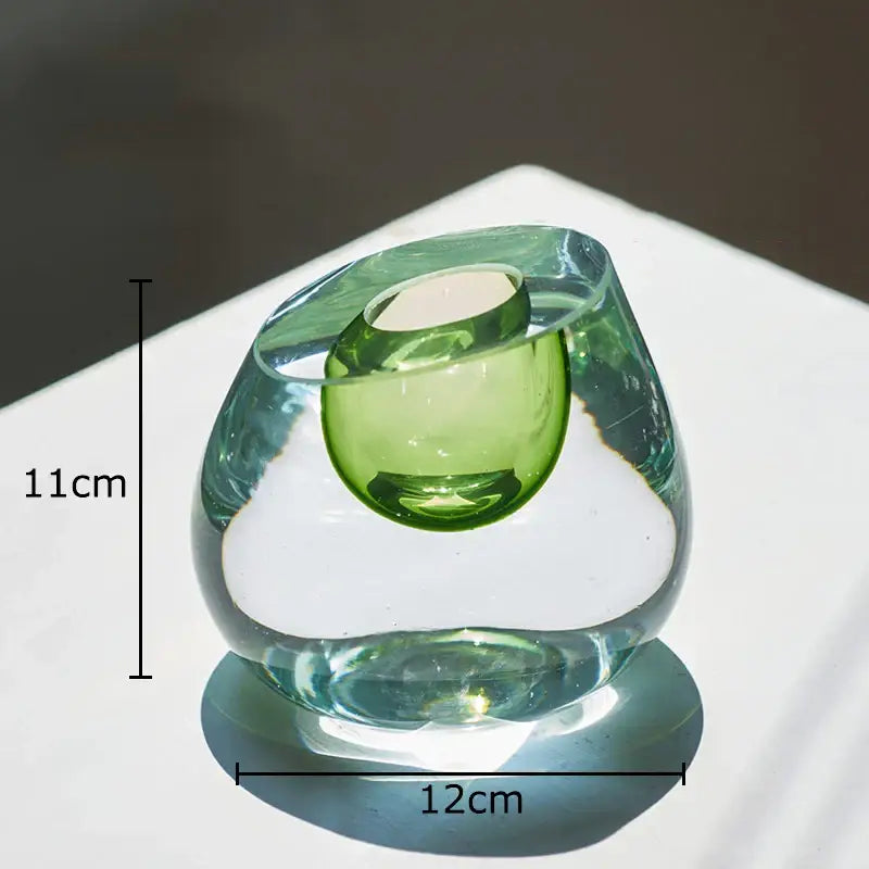 Modern translucent green decorbites colorful glass candle holder with rounded design and integrated single candle well