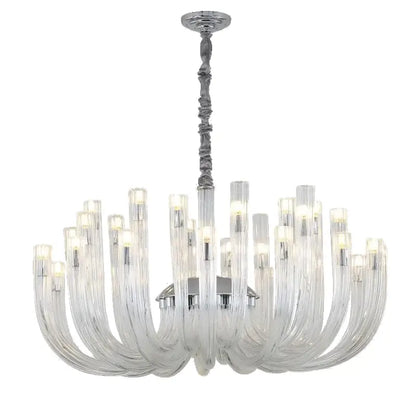 Modern transparent glass chandelier led with chrome stem and curved arms holding illuminated bulbs for dining room