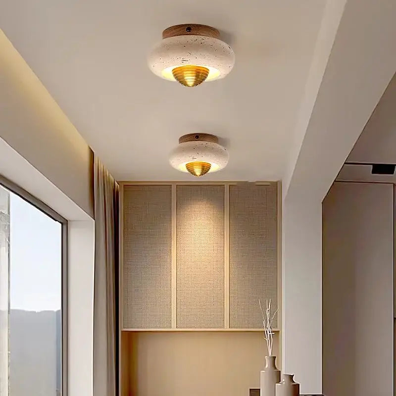 Modern travertine and walnut led ceiling light with textured white concrete disc, gold diffuser, and wooden base for living room decorbites led ceiling