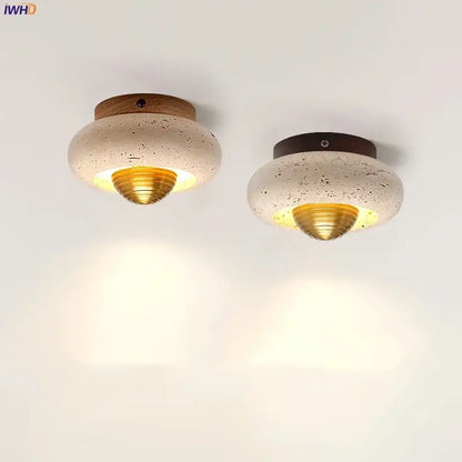 Two modern ceiling lights with speckled beige travertine shades, brass centers, and walnut rings for decorbites led ceiling lamp