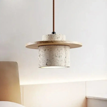 Minimalist pendant light with off-white travertine body and walnut disc accent cord pendant bulb included for kitchen use