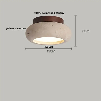Modern travertine glass ball led ceiling light with textured yellow travertine body and dark wood canopy for bedroom decorbites