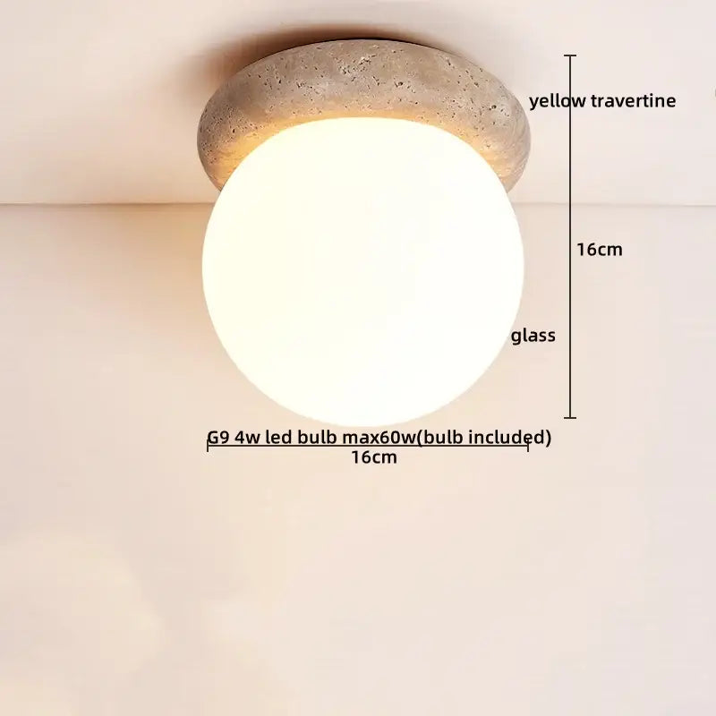 Rounded glass globe ceiling light with textured yellow travertine base for bedroom decorbites glass ball led fixture