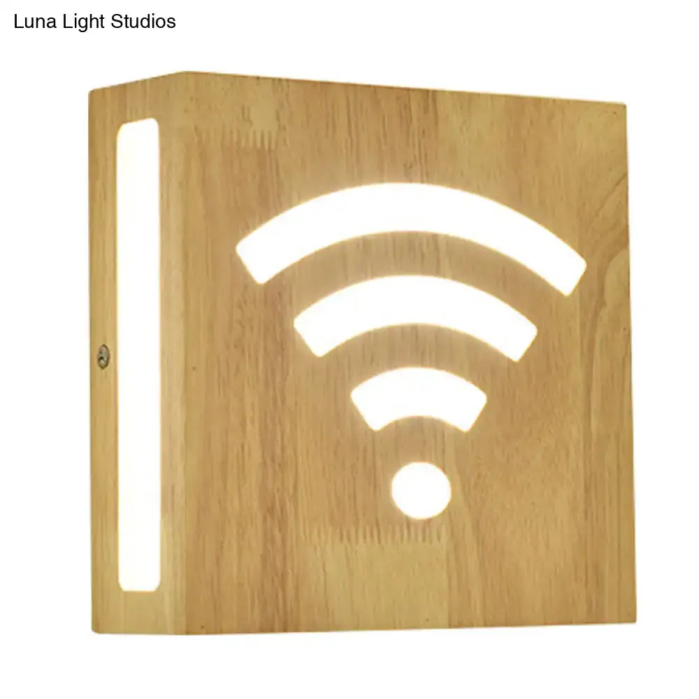 Modern tree pattern bamboo wall light with light wood finish and glowing wi-fi cutout direct wired electric wall light