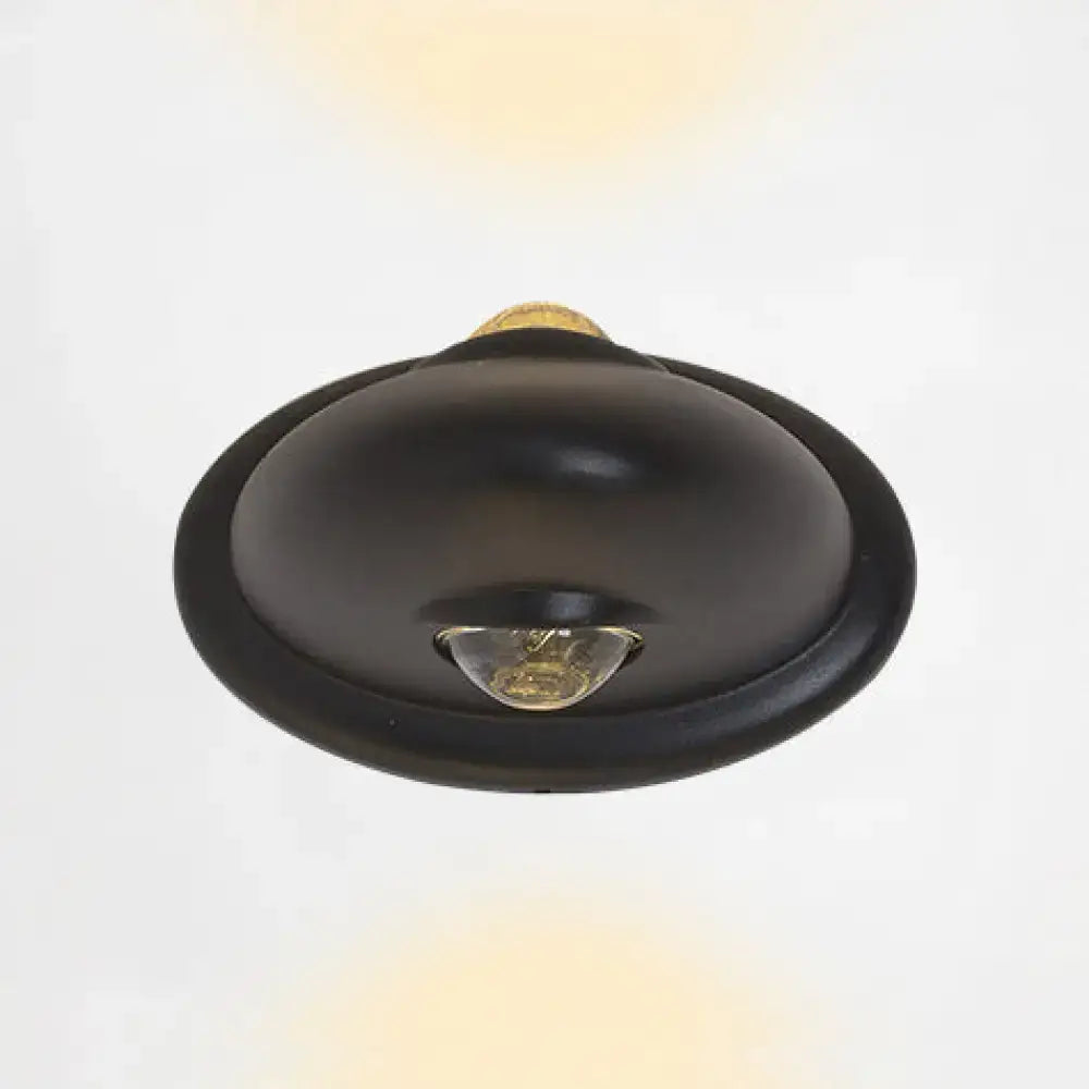 Modern triangle white and chrome bedroom wall sconce lamp featuring a black oval ceiling light with gold bulb and metallic accents