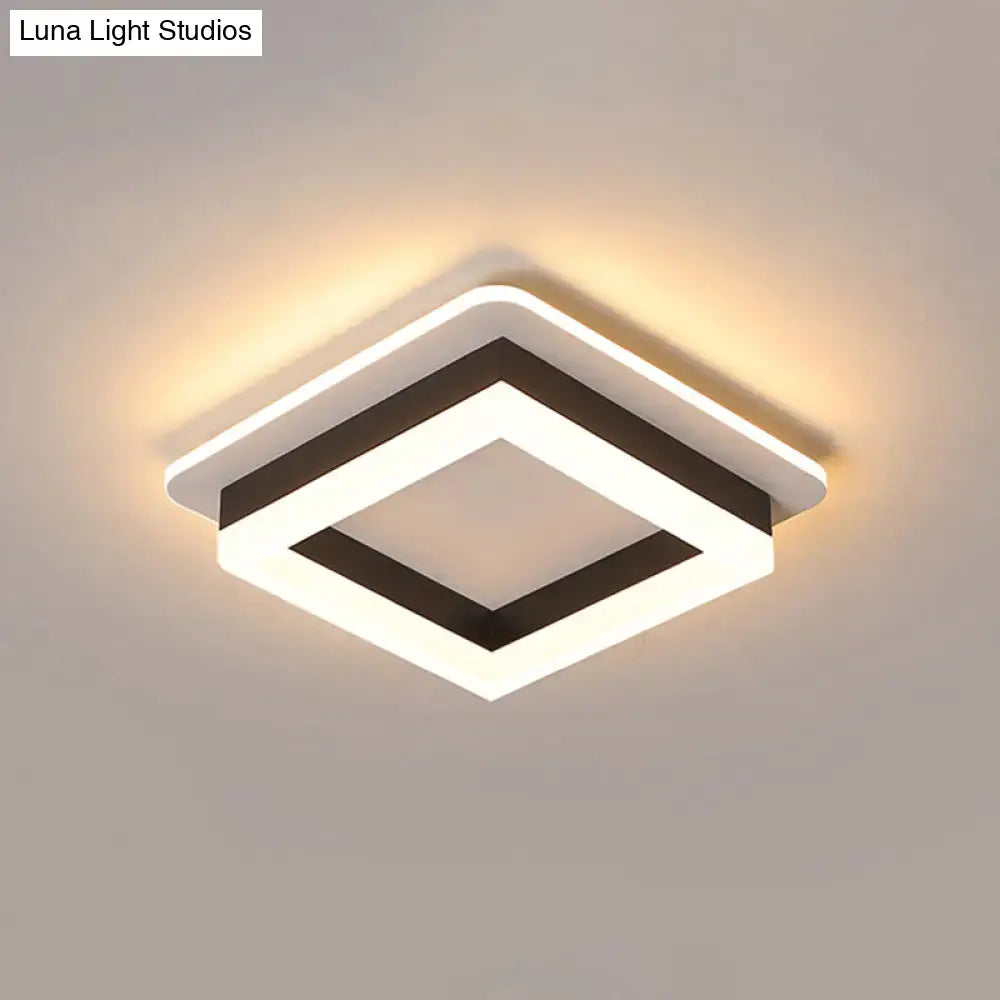 Modern DecorBites™ compact metal led flush mount ceiling light with white and black geometric design and warm acrylic diffuser glow