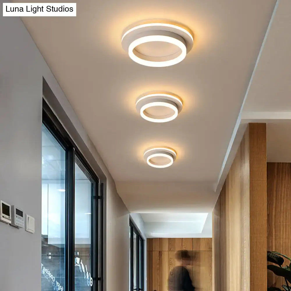 Three decorbites compact metal led flush mount ceiling lights with white acrylic diffuser and warm glow