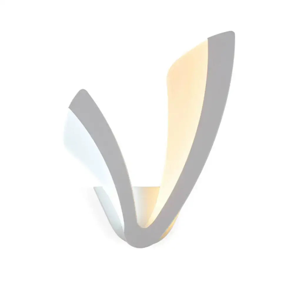 Modern v shaped white wall mounted light with sleek metallic arms and warm white ambient glow for bedroom use