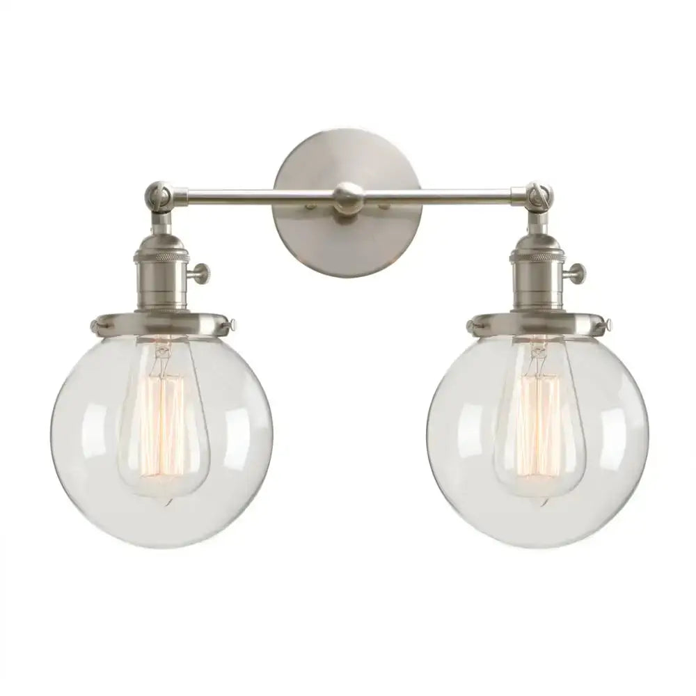 Brushed nickel double ball heads wall sconce with clear glass shades and exposed filament bulbs for bedroom lighting