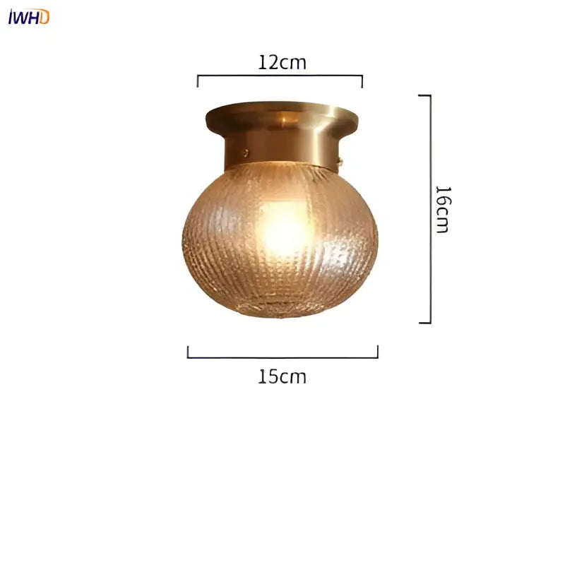 Modern vintage gold glass ball ceiling light with brass finish and textured amber glass shade for bedroom decorbites glass ball