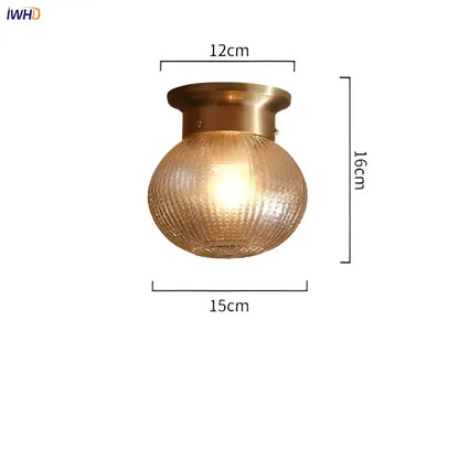 Modern vintage gold glass ball ceiling light with brass finish and textured amber glass shade for bedroom decorbites glass ball