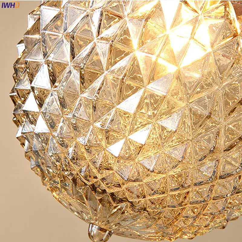 Modern vintage gold glass ball ceiling light featuring a faceted geometric diamond pattern decorbites glass ball