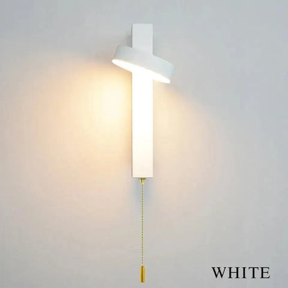 White modern wall sconce with sleek minimalist design and gold-toned pull chain for adjustable modern wall sconces