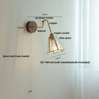 Modern walnut and brass clear glass led wall sconce with copper finish and walnut mounting plate for stair lighting