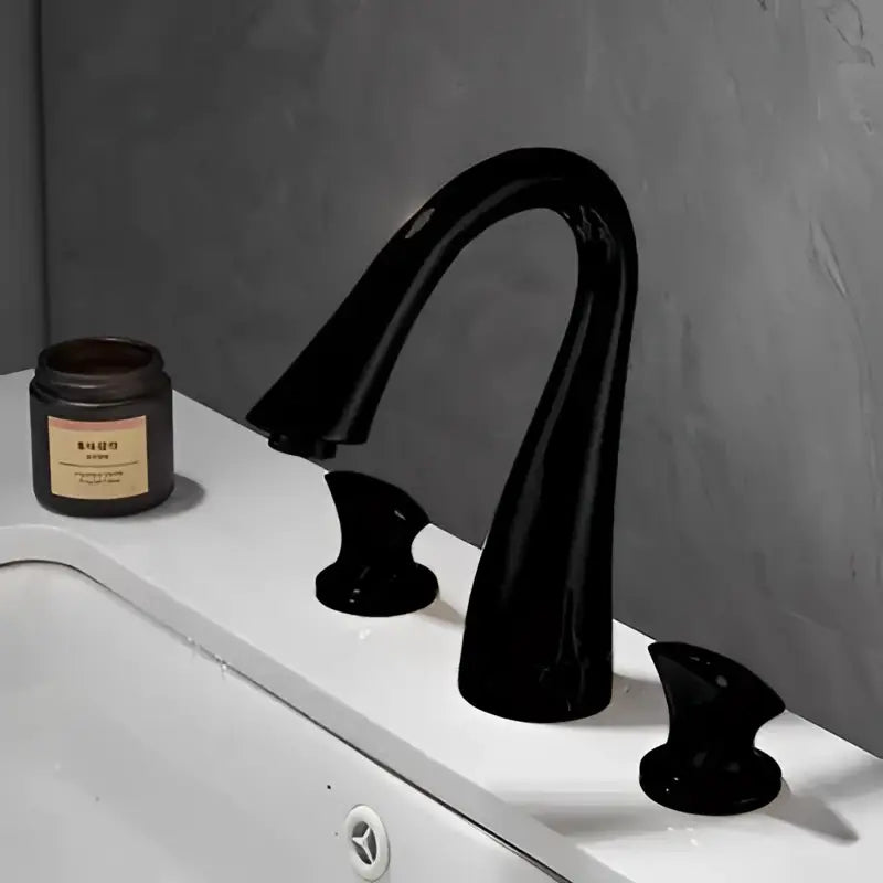 Modern waterfall black and gold basin faucet with matte finish and three handles by decorbites black for bathroom sink
