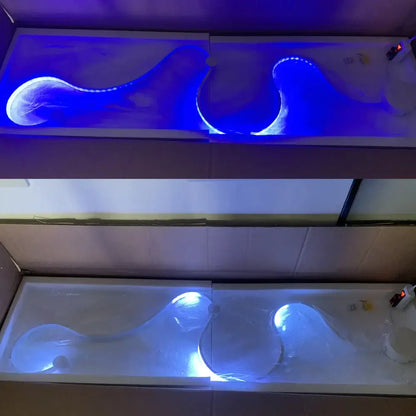 Blue led wall lights with flowing wave design embedded in translucent resin for modern living room decor
