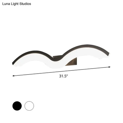 Modern wavelet black and white wall sconce with sleek illuminated body and matte bronze bracket for bathroom led lighting