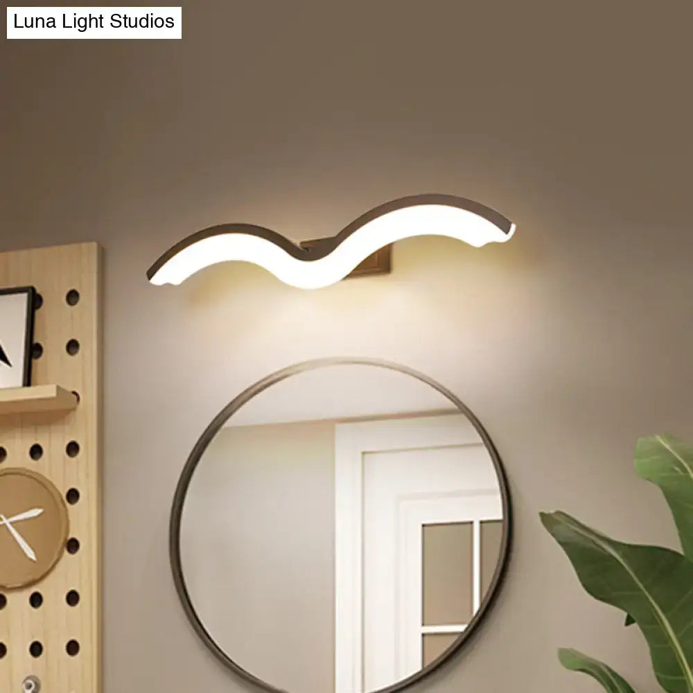 Modern wavelet black and white wall sconce bathroom led light with sleek white illuminated body and dark metallic bracket