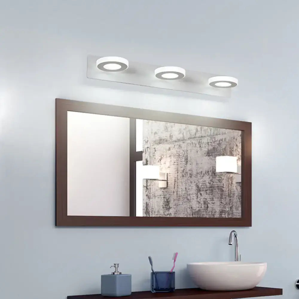 Modern white 3-light adjustable wall light fixture with circular LED bulbs on a sleek minimalist bathroom wall light fixture