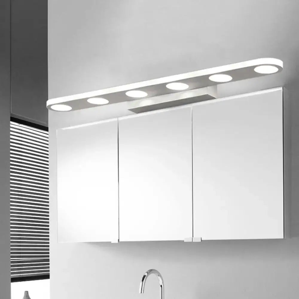 Modern white vanity wall light with five circular led bulbs providing warm white light for bathroom use