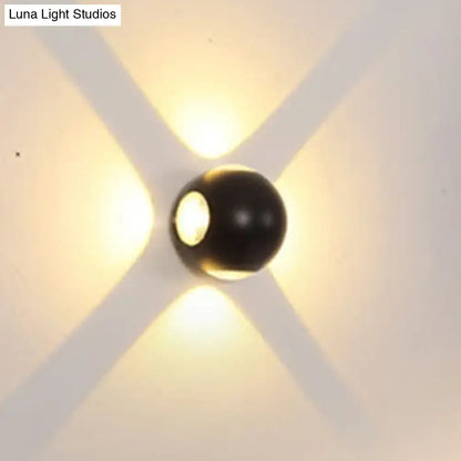 Modern white 4 light dome wall sconce with black spherical design casting warm cross light patterns 110v-120v lamp