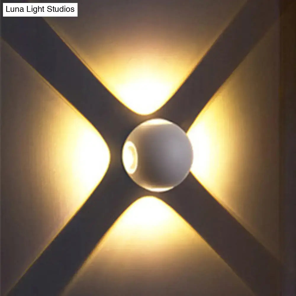 Modern white 4 light dome wall sconce with warm-toned spherical design emitting soft golden light 110v-120v