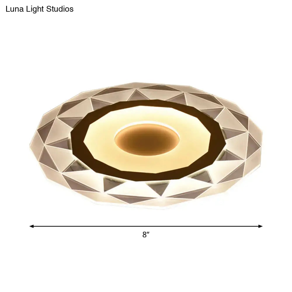 Modern white acrylic cloud led table lamp with geometrically faceted ceiling light and warm glowing center for bedroom