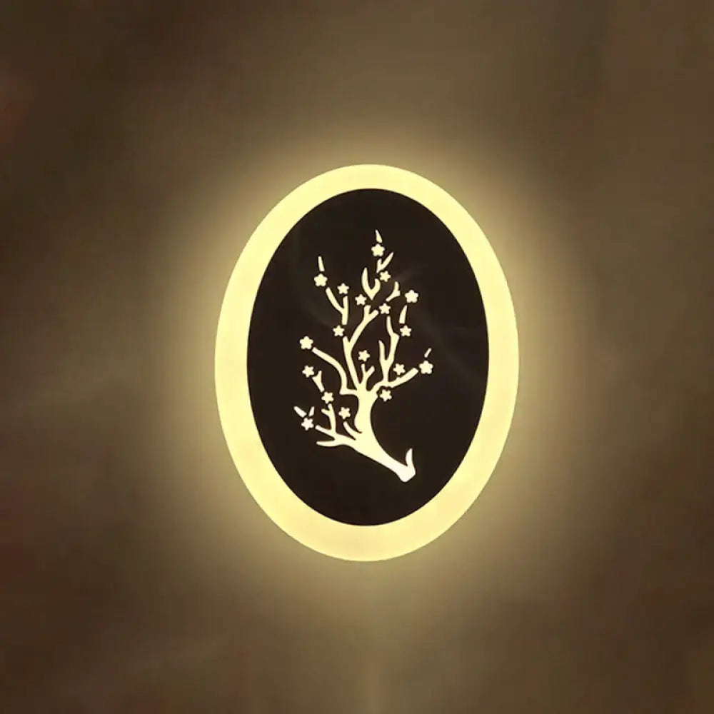 Warm-toned white acrylic wall lamp with glowing yellow rim and illuminated white tree design for modern bedroom lighting