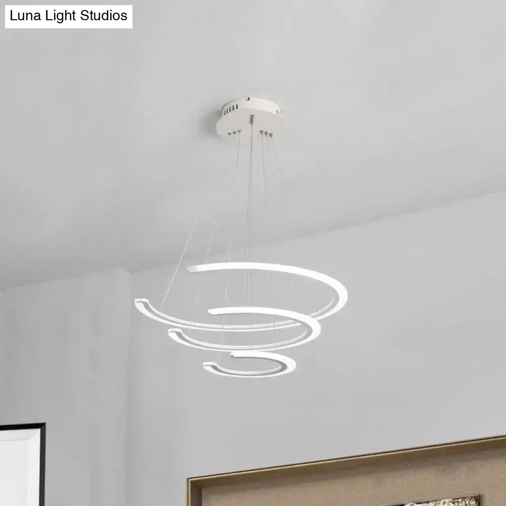 Modern white acrylic led DecorBites™ C ring dining room chandelier with three spiraling rings in warm natural light