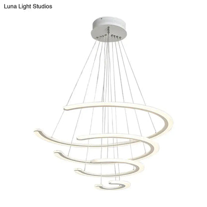 Modern white acrylic ring dining room chandelier with layered rings and warm white led light suspended by thin cables