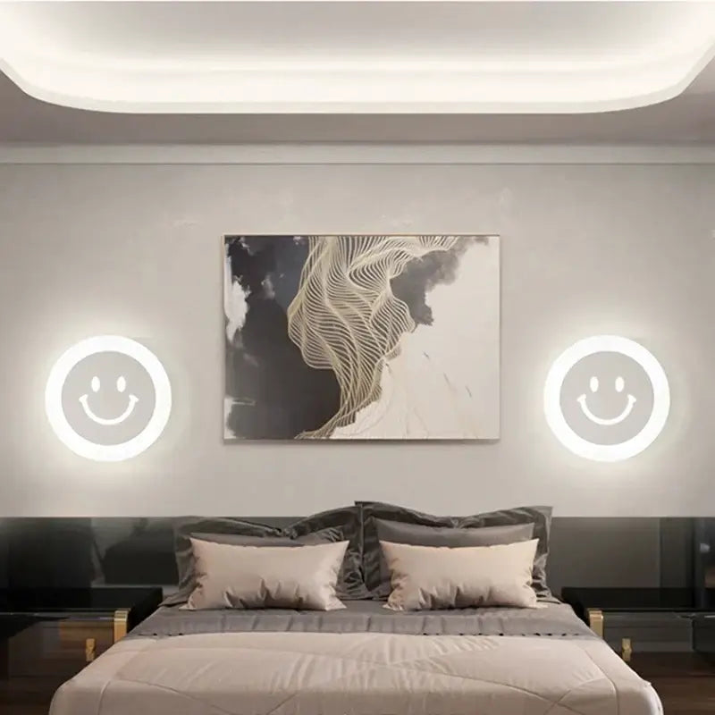 Modern white acrylic led wall sconce with smiling face design emitting soft white glow for childrens bedroom decorbites acrylic led wall sconce